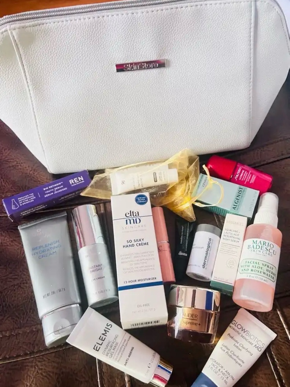 Lots of high-end Skincare products plus travel bag!